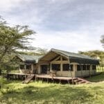 Luxury safari tented camp in the African wilderness surrounded by nature