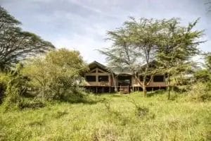 Porini Mara Family tent in the Ol Kinyei Conservancy surrounded by nature. Photo credit Tomas Rodriguez
