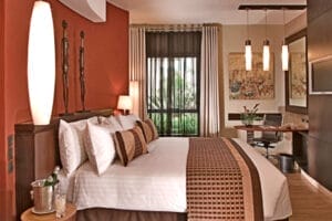 Luxury safari lodge bedroom with modern African décor and king-size bed in Kenya