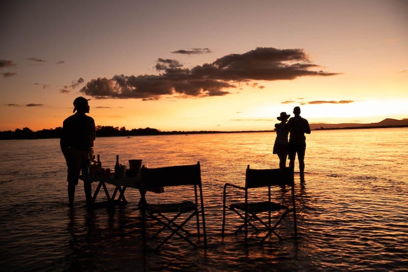 Tembo Plains Camp is tucked away into a thick riverine forest on the edge of the Zambezi River, in the private 128,000-hectare Sapi Private Reserve, east of Zimbabwe’s Mana Pools National Park.

Tembo Plains Camp and the 2-bedroomed Tembo Plains Suite fit into our highest camp level offering, the Réserve Collection of camps. Fellow Réserve Collection camps include Zarafa Camp, Selinda Camp, Duba Plains in Botswana, Mara Nyika Camp, Mara Plains Camp and ol Donyo Lodge in Kenya. It is also a proud member of Relais & Châteaux – the only luxury Zimbabwean safari camp currently with this honour.