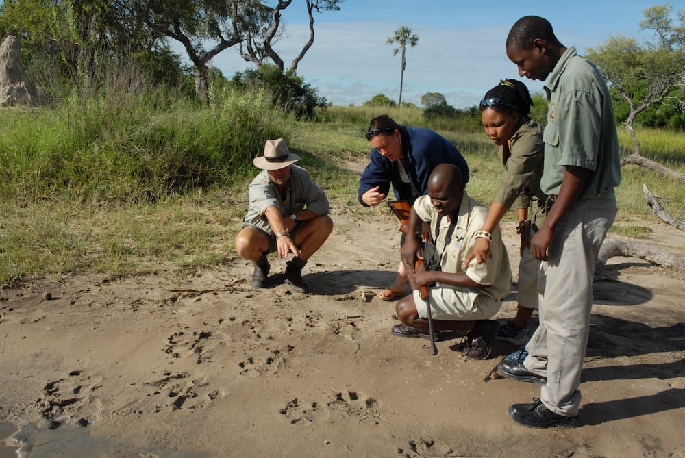 baines_camp._walking..discussing_spoor_4