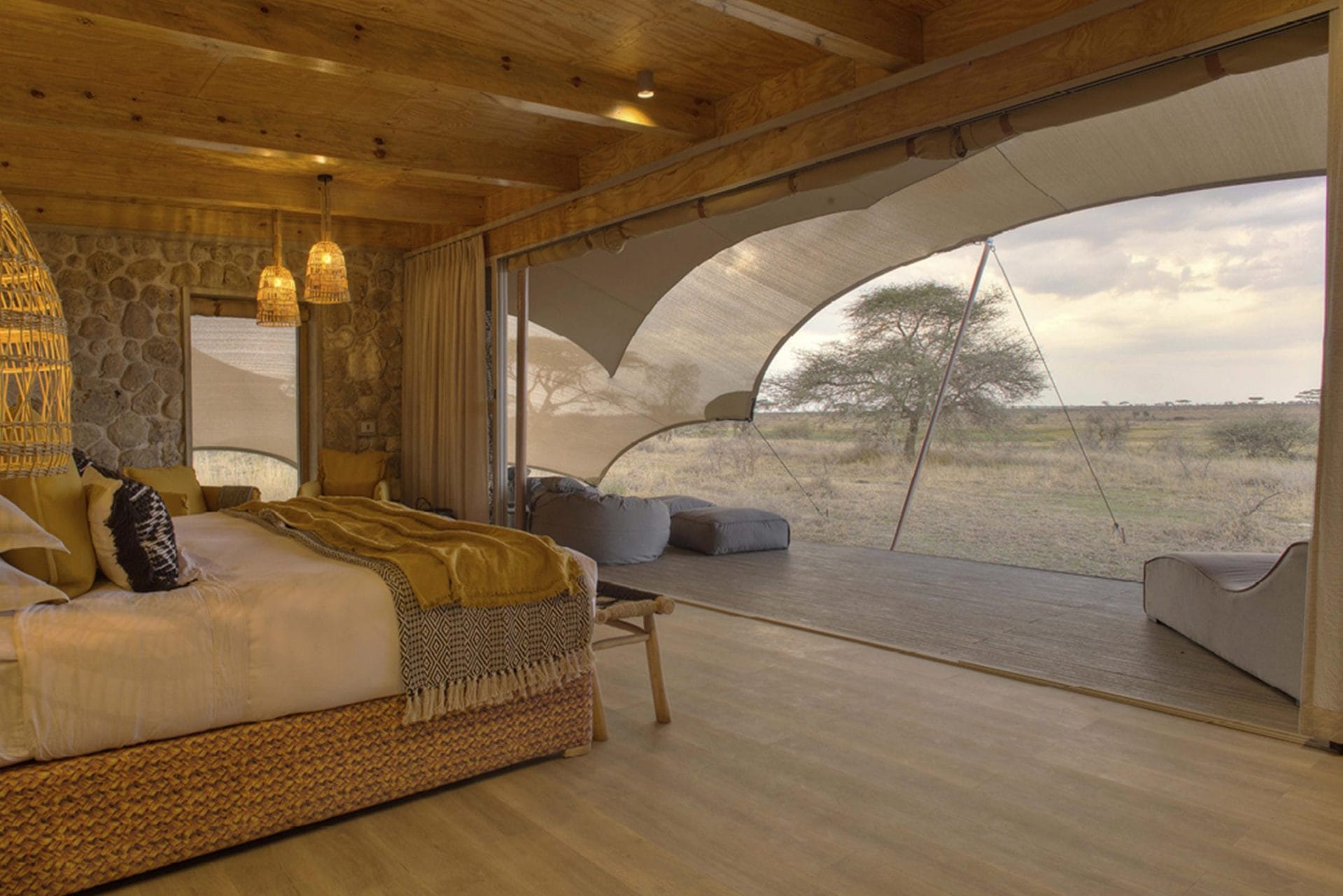 Namiri Plains Tent interior looking out onto the plains