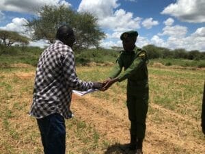 Newly Graduated Range Shaking Hands