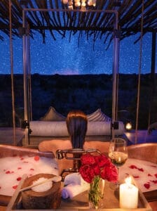 night time bath with stars in the background