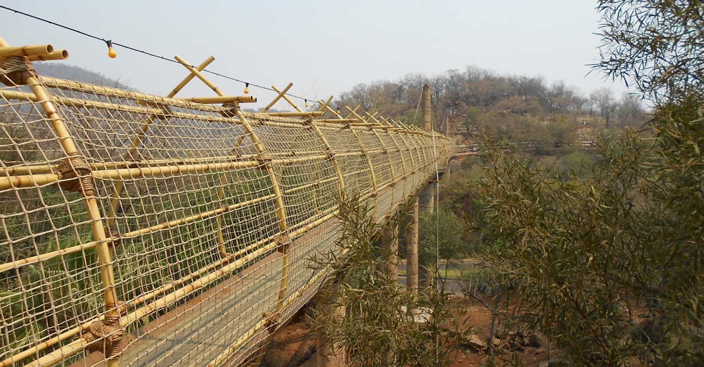 Sun City Hotel Bamboo and rope bridge over stream - South Africa