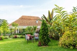 Five Volcanoes Hotel Gardens With Seating and Exotic Trees - Rwanda