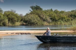 Watching birds from the dock Zambezi Mubala Lodge