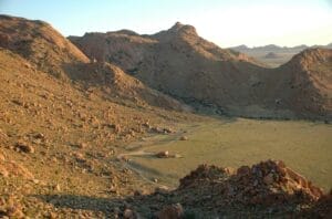 aerial shot of lodge in open space