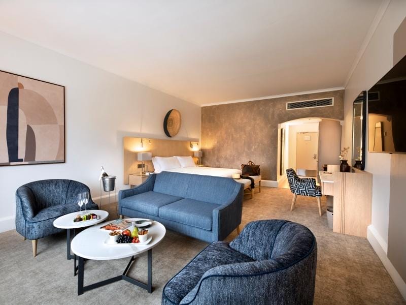 Victoria & Alfred Hotel Room interior with multiple armchairs and sofas - Alfred Basin's Working Dock