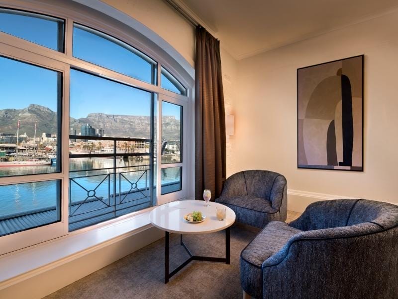 Victoria & Alfred Hotel Room Armchairs with view of dockyard - Alfred Basin's Working Dock