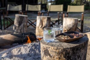 Porini Amboseli Camp - Fire & Drinks - photo credit Tom Mees