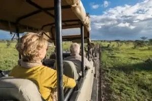 Porini Rhino Camp open gamedrive vehicle in Ol Pejeta Conservancy in Kenya - photo credit Axel Fassio