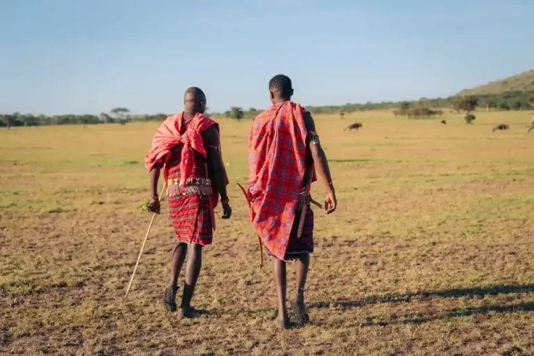 Maasai Guides from Porini Giraffe Camp walking in Ripoi Conservancy in Kenya - photo credit Karim & Marie